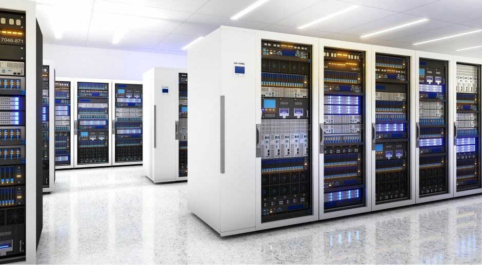 Rows of white server cabinets in a bright modern data center.